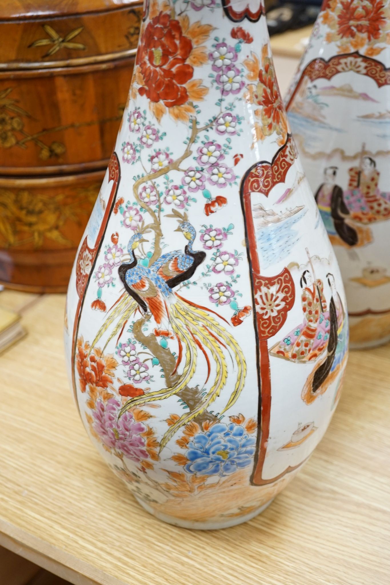 A large pair of Kutani vases, 56cm